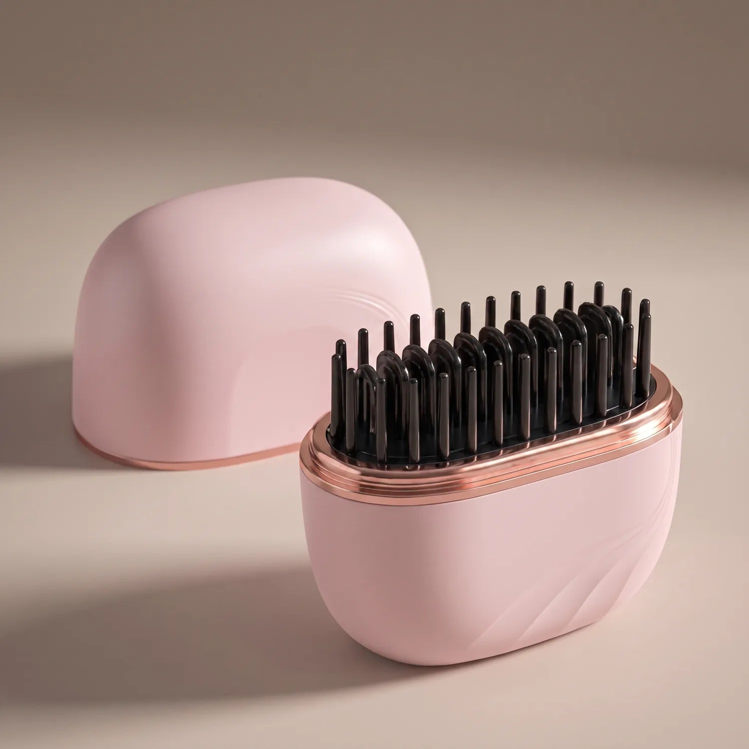 Blush pink Rove cordless smoothing comb open