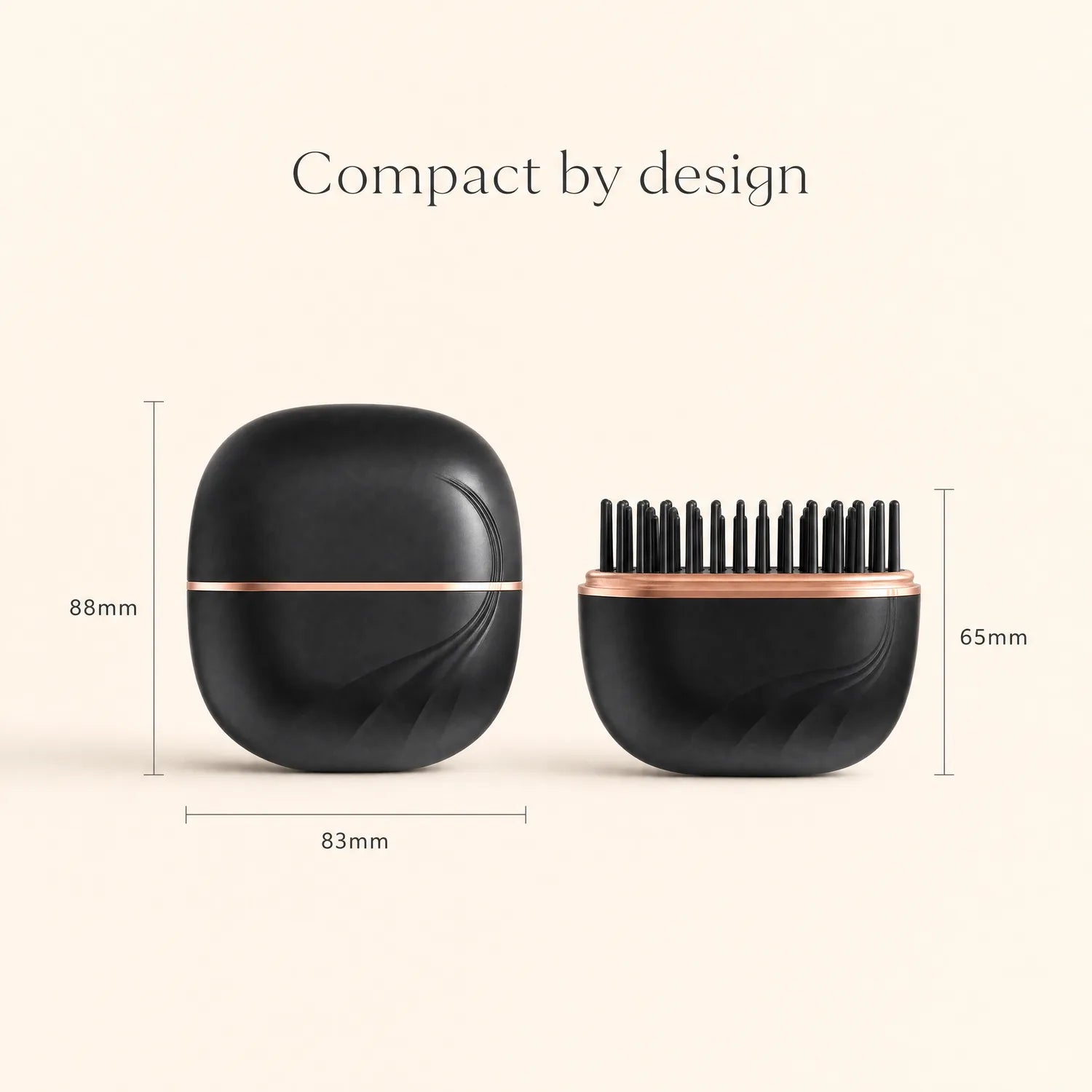 Black Rove smoothing comb held in hand for scale